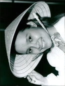 Actress Lea Salonga plays the title role in the musical "Miss Saigon" at the Theatre Royal, Drury Lane in London. - Vintage Photograph