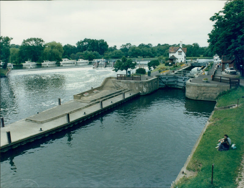 A view of the weir and the spring-fed Locht stream in Streakley, England. - Vintage Photograph