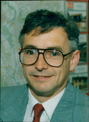 A beekeeper inspects a beehive in Winnipeg, Manitoba. - Vintage Photograph