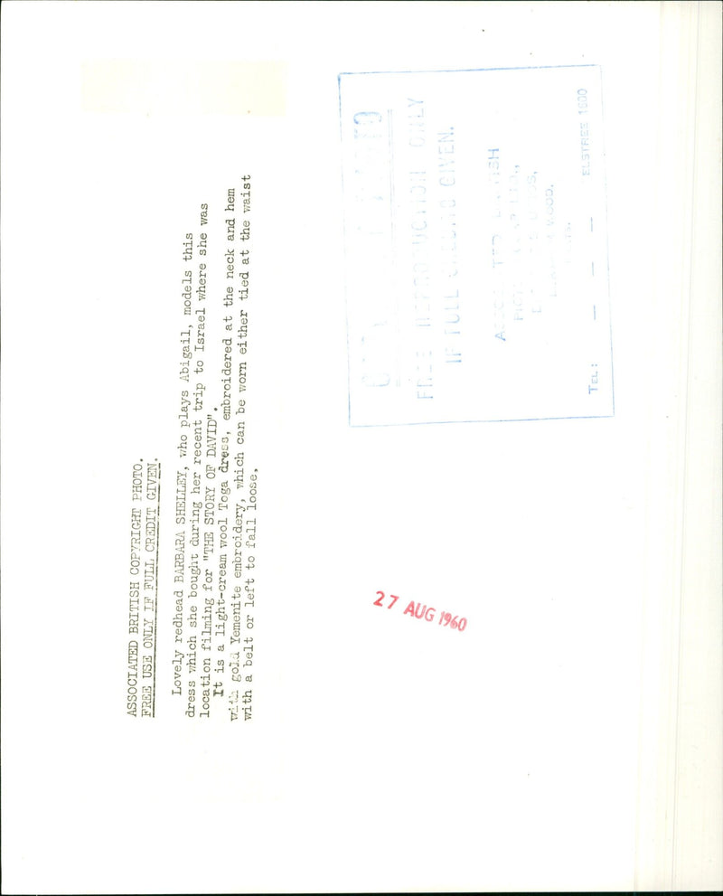 Actress Barbara Shelley models a light-cream wool Toga dress with gold Yemenite embroidery. - Vintage Photograph