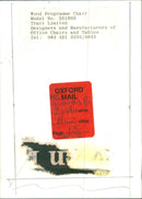 A Wood Programme Chair Model No. 551WSS Tract Limited design in an office setting. - Vintage Photograph