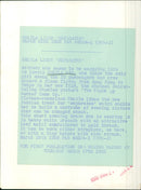 Actress Sheila Sim models a white brocade evening dress with a gold leaf motif. - Vintage Photograph