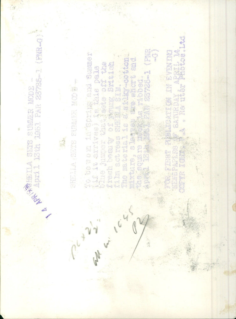 A woman models a new summer outfit in the streets of Berlin, Germany. - Vintage Photograph