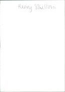 A girl stands in a garden of sunflowers in England. - Vintage Photograph