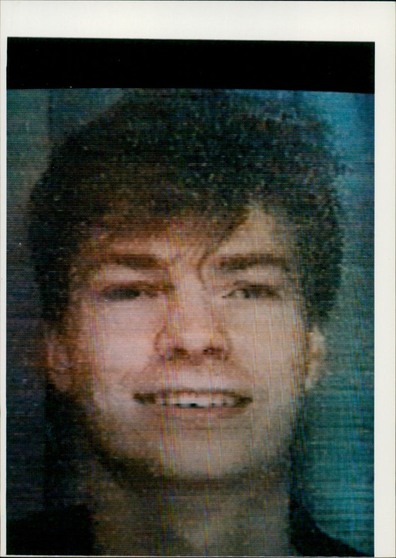 A girl stands in a garden of sunflowers in England. - Vintage Photograph