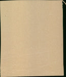 A hiker stands atop a cliff overlooking a valley. - Vintage Photograph