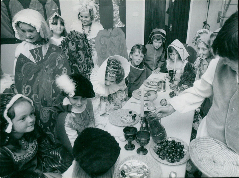 A deer stands in a meadow on a sunny day. - Vintage Photograph