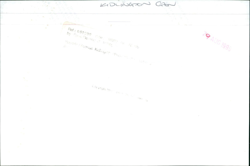 A young girl stands in the street in front of a house in Waverley Avenue. - Vintage Photograph