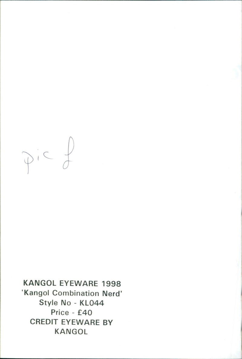 A model wearing a 'Kangol Combination Nerd' eyewear hat. - Vintage Photograph