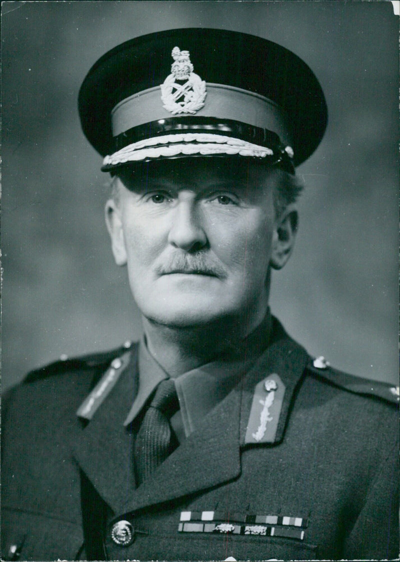 Brigadier Roger E.T. St. Join, Commander of the British Army Staff and Military Attache in Washington since January 1963, poses for a portrait study by Bassano. - Vintage Photograph