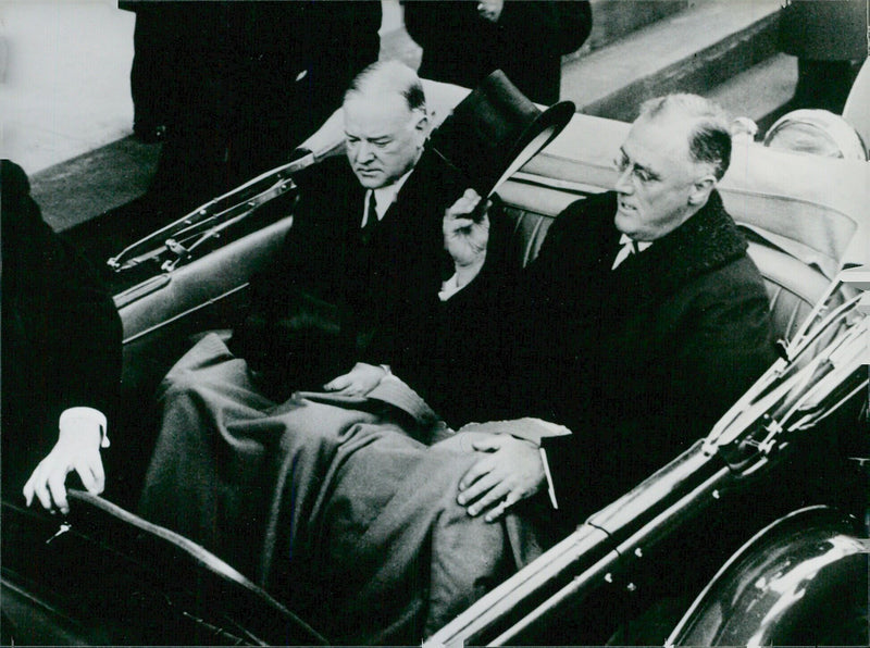 President Franklin Delano Roosevelt and Herbert Hoover ride in a limousine in 1936. - Vintage Photograph