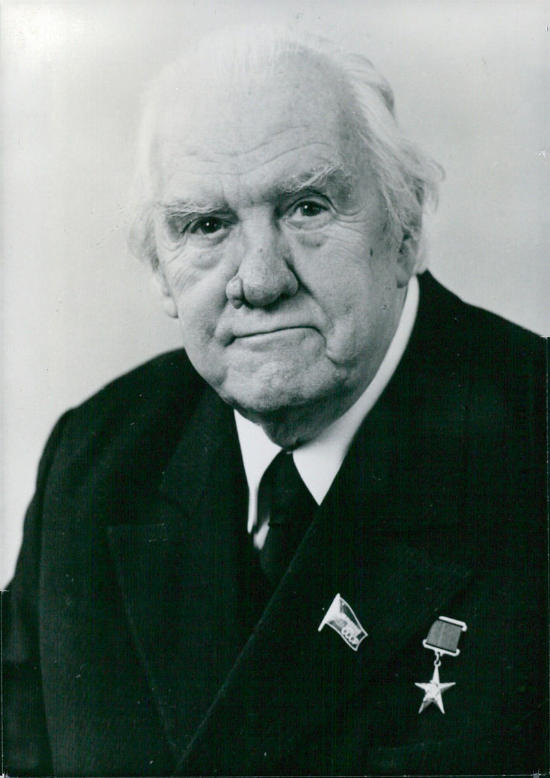 Soviet writer Nikolai S. Tikhonov, Chairman of the Soviet Peace Committee and Chairman of the Committee for Literature and the Arts, poses in Moscow in May 1978. - Vintage Photograph