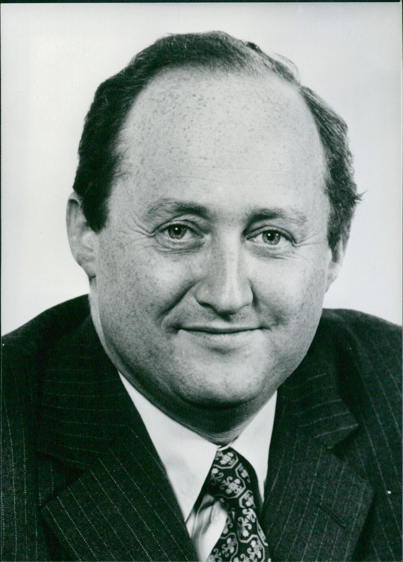 Christopher Tugendhat, Member of the European Economic Communities Commission, poses for a photo in London in 1987. He is responsible for Budget and Financial Control, Financial Institutions, and Fiscal Affairs. - Vintage Photograph