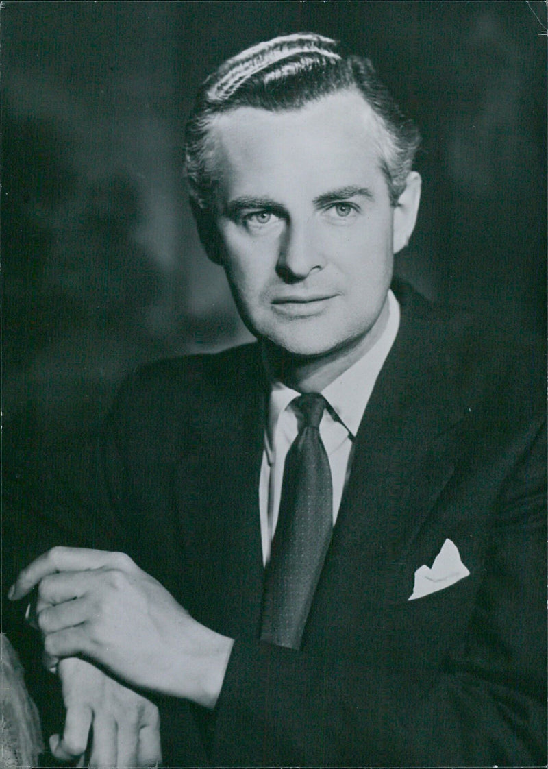 Derek Bond, British stage and screen actor, is appointed a guest announcer on the BBC television service. - Vintage Photograph