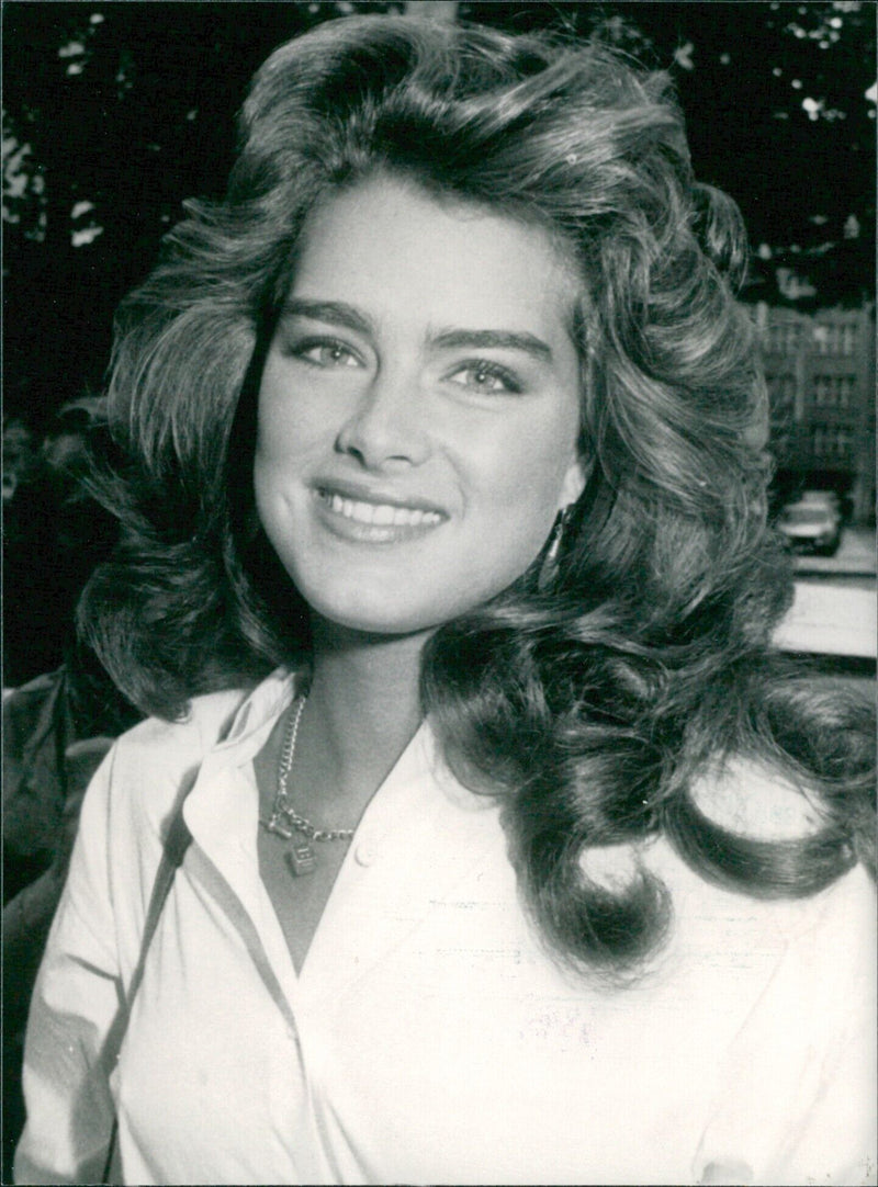 US actress Brooke Shields, 19, takes a break from filming to pursue full-time education. She is best known for her roles in the films "Blue Lagoon" and "Pretty Baby" and has recently been linked with pop superstar Michael Jackson. - Vintage Photograph