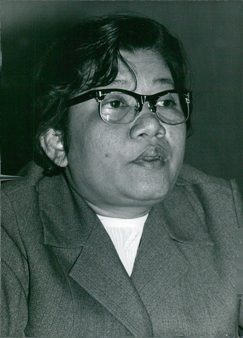 On August 8, 1980, Mrs. Ineng Thirith, Minister for Social Affairs in the Khmer Rouge government of Democratic Kampuchea, is pictured in Phnom Penh, Cambodia. - Vintage Photograph