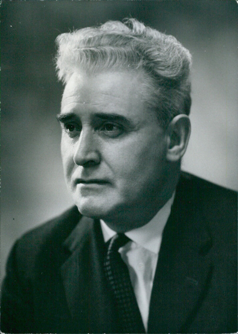 British Politician Robert Edward Woof, M.P. for Blaydon, County Durham, is pictured in a portrait study. - Vintage Photograph