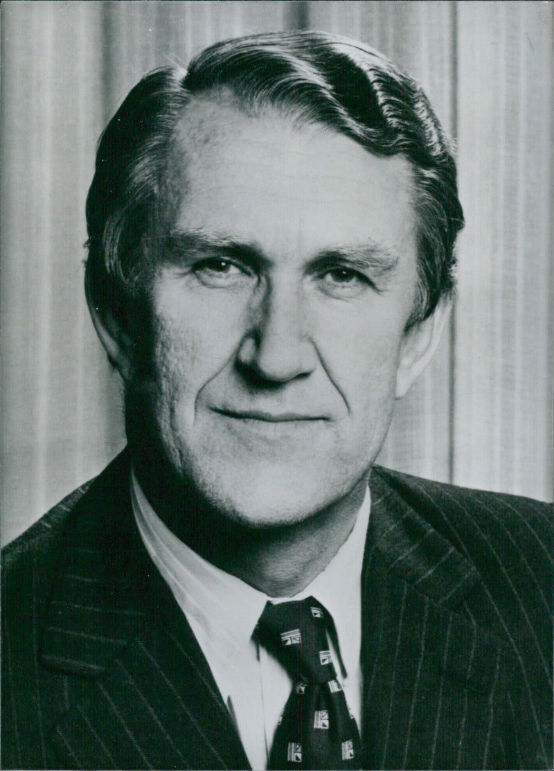 Australian Prime Minister Malcolm Fraser poses for a portrait in 1987, having been in office since November 1975. - Vintage Photograph