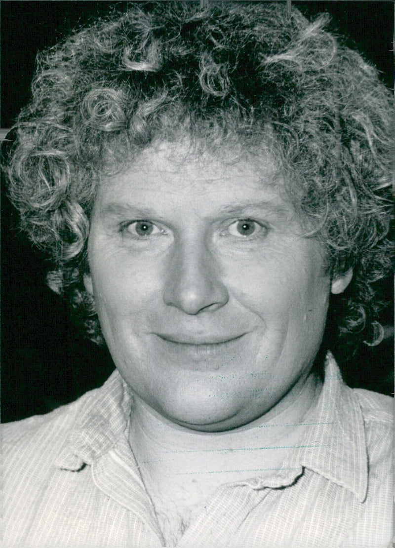 British actor Colin Baker poses for the camera while looking at the camera. - Vintage Photograph