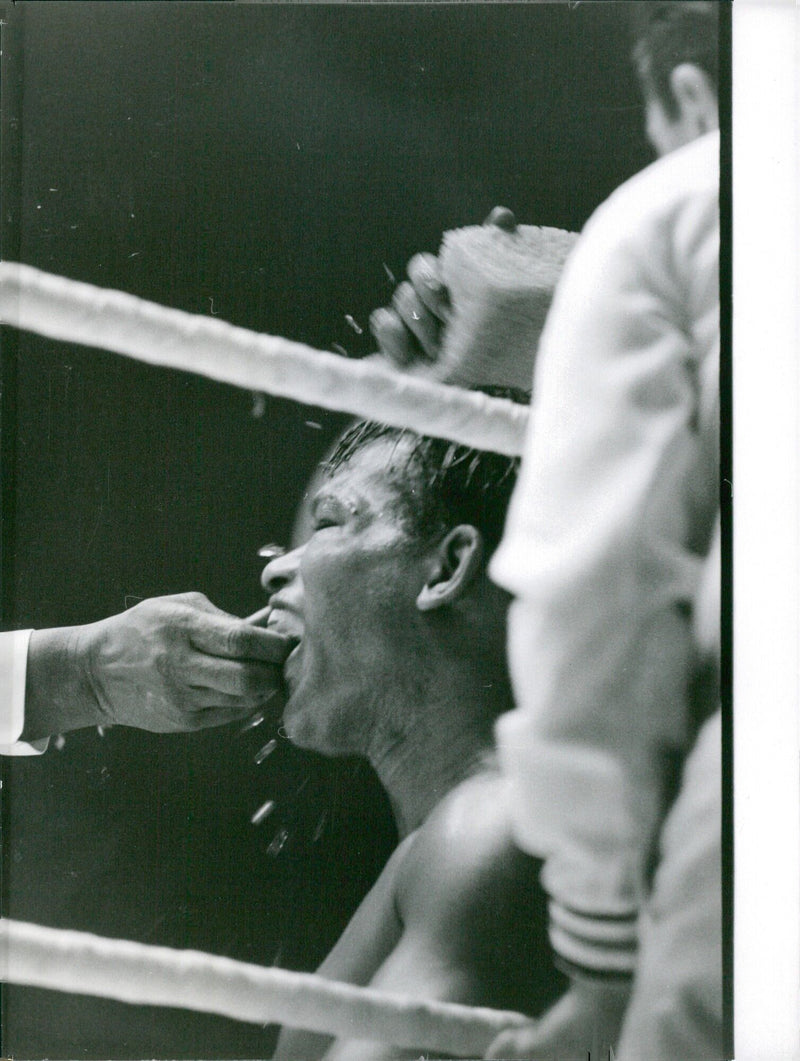 Boxing legend Sugar Ray Robinson poses in Stockholm, Sweden on October 21, 1962. - Vintage Photograph