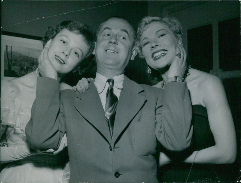 Swedish sisters Elisaweta and Sylvia Åkesson pose for a photograph taken by photographer Åke Wen Söderblom in 1954 in Stockholm, Sweden. - Vintage Photograph