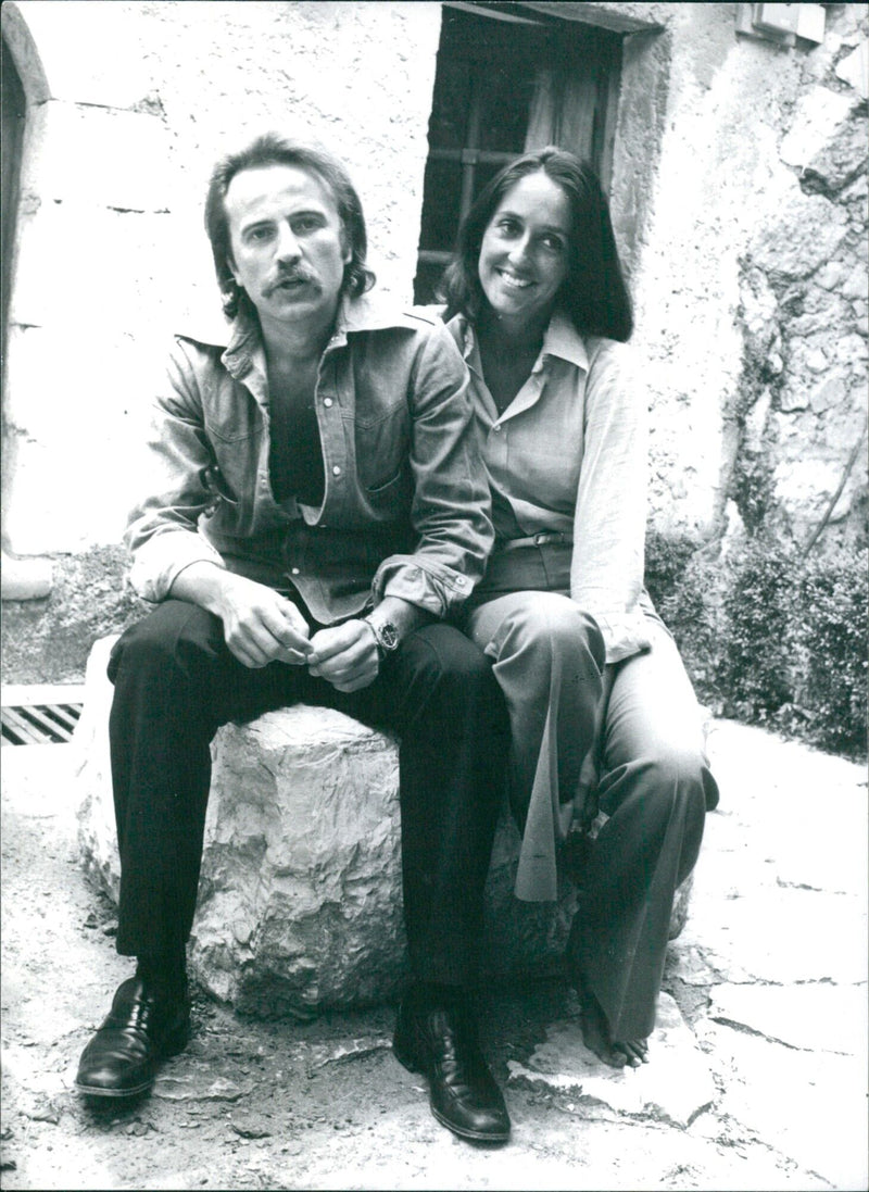 French revolutionary writer Regis Debray and folksinger Joan Baez reunite in Juan les Pins, France, where Miss Baez was performing in concert. The two are longtime friends. - Vintage Photograph