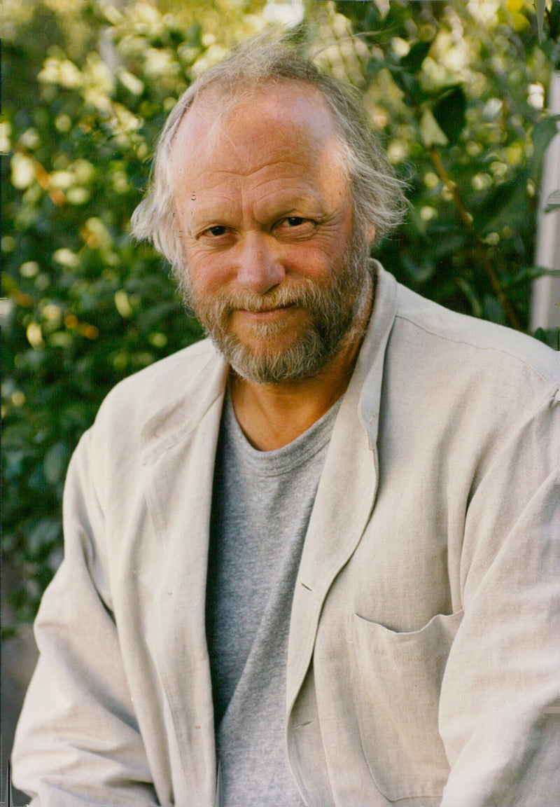 Swedish director Jan Troell poses at the International Magazine Service AB in Sweden. - Vintage Photograph