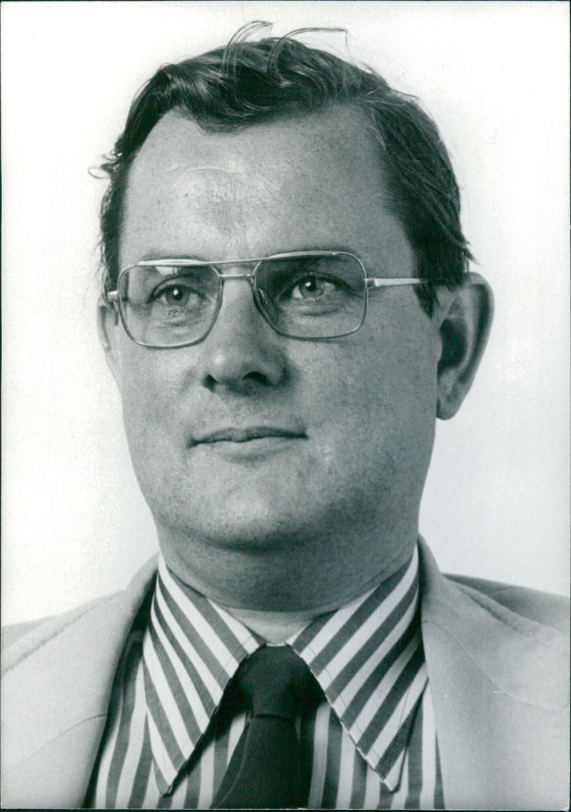 British Politician John Tomlinson, Under-Secretary of State at the Foreign and Commonwealth Office, is pictured in 1977. - Vintage Photograph