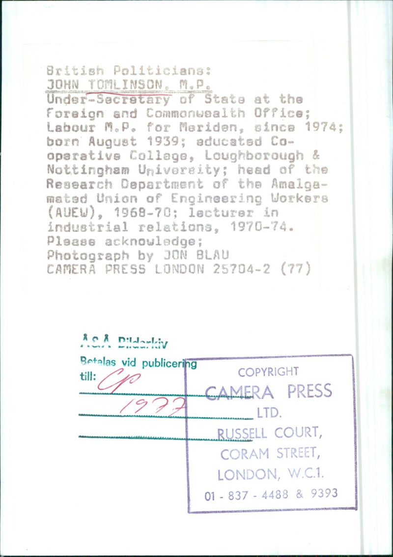 British Politician John Tomlinson, Under-Secretary of State at the Foreign and Commonwealth Office, is pictured in 1977. - Vintage Photograph