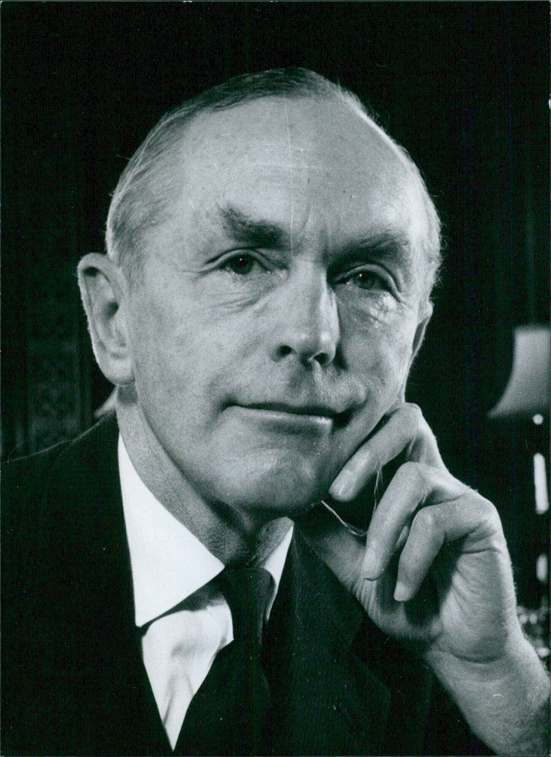 Prime Minister of Britain, Sir Alec Douglas-Home, poses for a portrait study in 1963. - Vintage Photograph