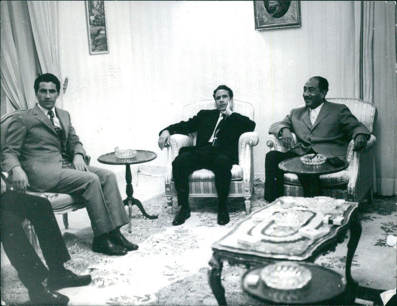 Leaders of Libya and Egypt, Major Abdel Salam Jalloud, Colonel Moammer al Gadafy, and President Anwar al Sadat, meet in Cairo to discuss strained relations after a plot against the Egyptian regime. - Vintage Photograph