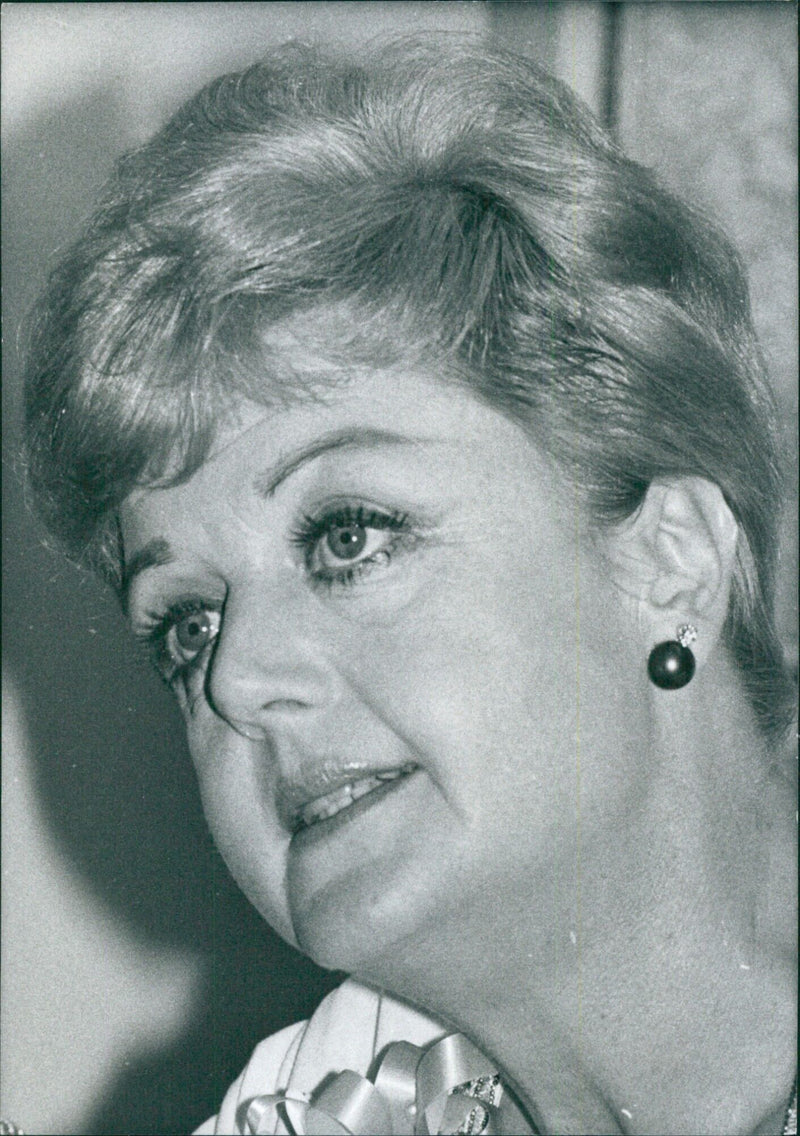 American actress Angela Lansbury poses for a portrait. - Vintage Photograph