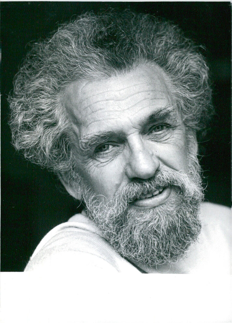 Veteran American peace campaigner Bernard Benson is seen promoting his cause and book, "Peace", in this 1983 photo by Jane Bown for Camera Press London. - Vintage Photograph