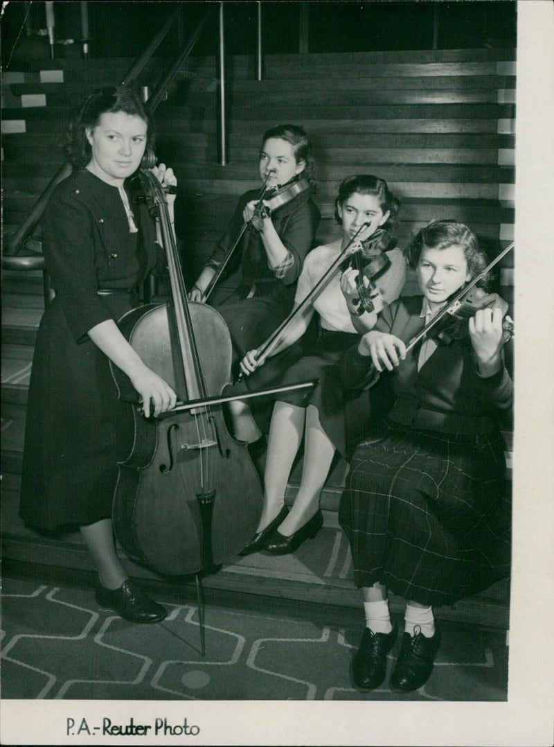 Members of the London Schools Symphony Orchestra rehearse for their first public concert at the Royal Festival Hall. - Vintage Photograph