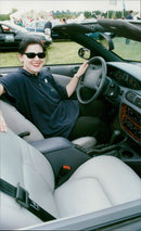 Pearl Givinchi-Lewis in her Chrysler - Vintage Photograph