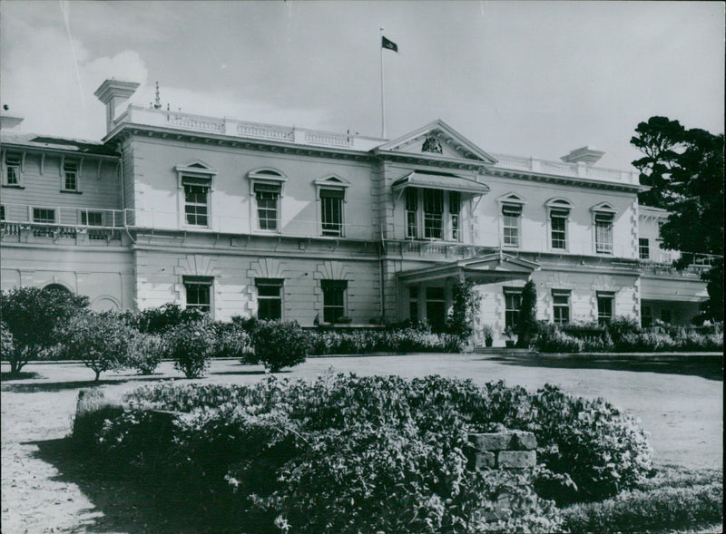 Queen Elizabeth II and Prince Philip, Duke of Edinburgh, will stay at Government House in Auckland, New Zealand, beginning December 22nd, 1953. - Vintage Photograph