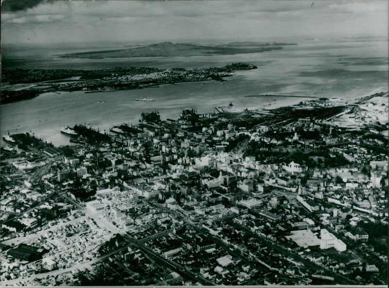 A fine aerial view of Auckland, New Zealand, in anticipation of the Queen and Duke of Edinburgh's arrival on December 22nd, 1953. - Vintage Photograph