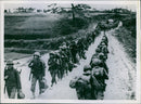 Soldiers marching. - Vintage Photograph