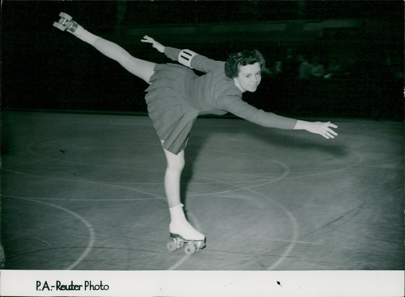 Jean Pethean of Gorton, Manchester practises for the European amateur figure and pairs roller skating championship. - Vintage Photograph