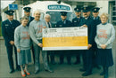 Station Officer Richard Quien receives a cheque for £2,100 from John Flood at Didcot Ambulance Station during the British Heart Foundation's PayLIFE Saver Appeal. - Vintage Photograph