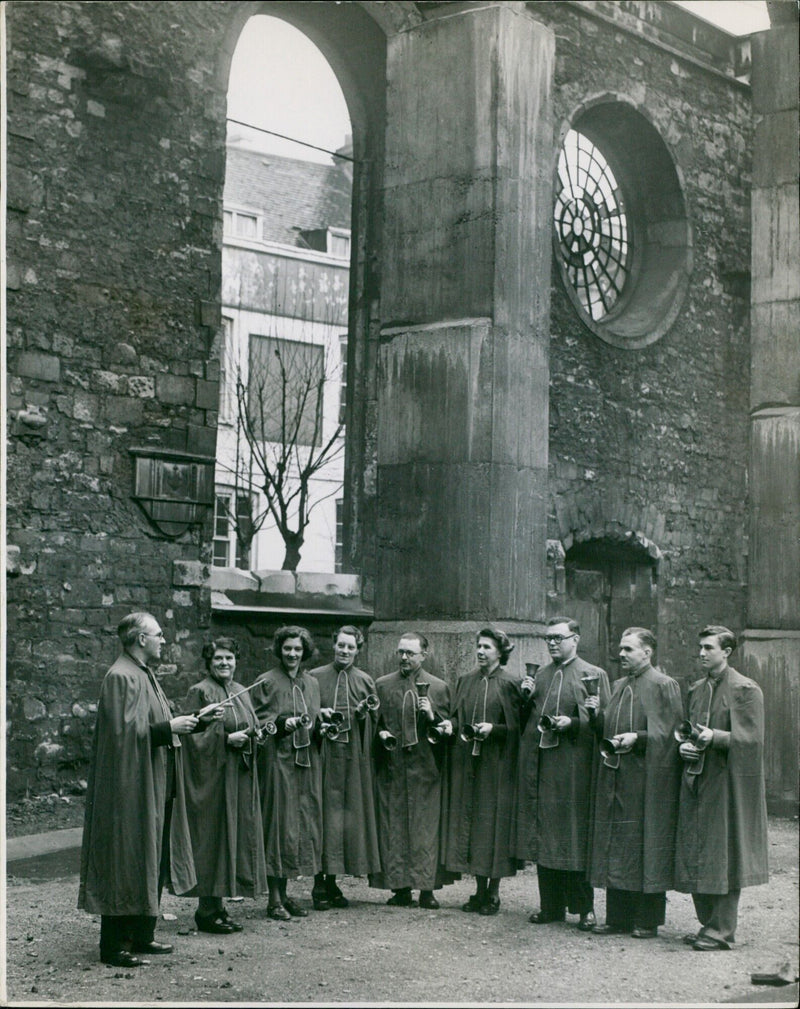 Handbell concert held in the ruins of St. Bride's Church on St. Bride's Day. - Vintage Photograph