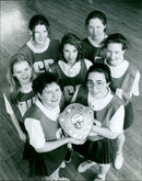 The E Wood Green School netball squad pose for a photo. - Vintage Photograph