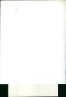 A woman demonstrating the new Hoover De Luxe Cleaner Model 652A. - Vintage Photograph