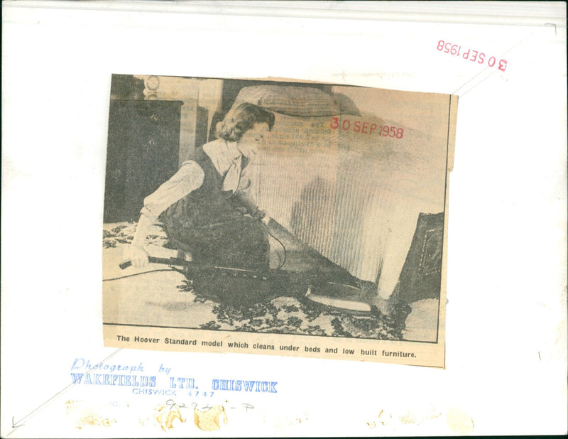 A Hoover Standard model vacuum cleaner. - Vintage Photograph