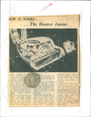 A Hoover Junior vacuum cleaner demonstrating how it works. - Vintage Photograph