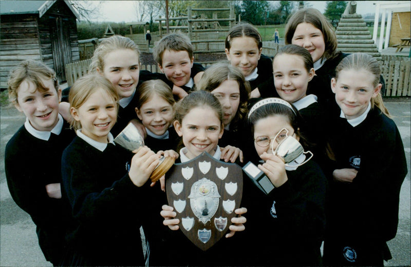 Harwell Primary School Netball Team celebrates winning the Harwell Trophy. - Vintage Photograph