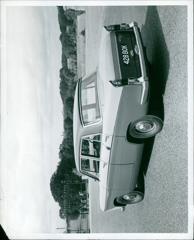 The Wolseley 16/60 Saloon, an upgrade to the popular 15/60 model, features a wider track, longer wheelbase, and a new 1682 c.c. version of the B.M.C. Scrics B engine. - Vintage Photograph