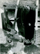 Musicians playing a lute at a medieval weekend event. - Vintage Photograph