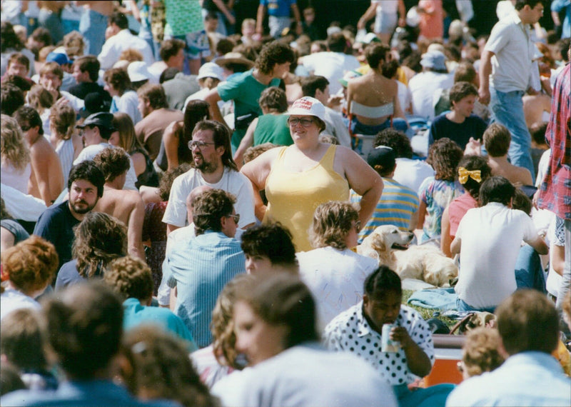 A fan of 69 MUSIC is seen enjoying the music at FaK Festival Croppery. - Vintage Photograph