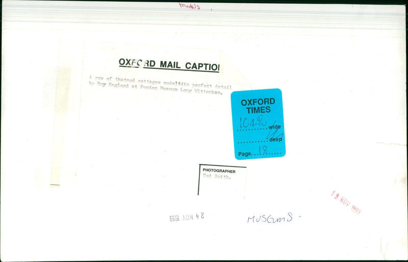 A model of thatched cottages on display at Pendon Museum in Long Wittenham. - Vintage Photograph